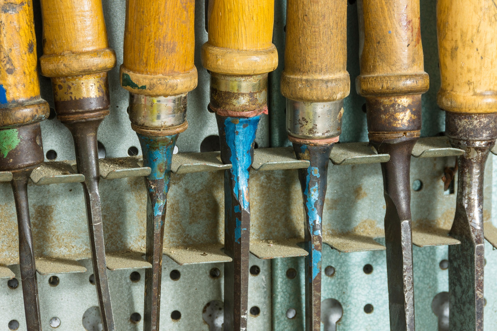 Chisels arranged on a workbench