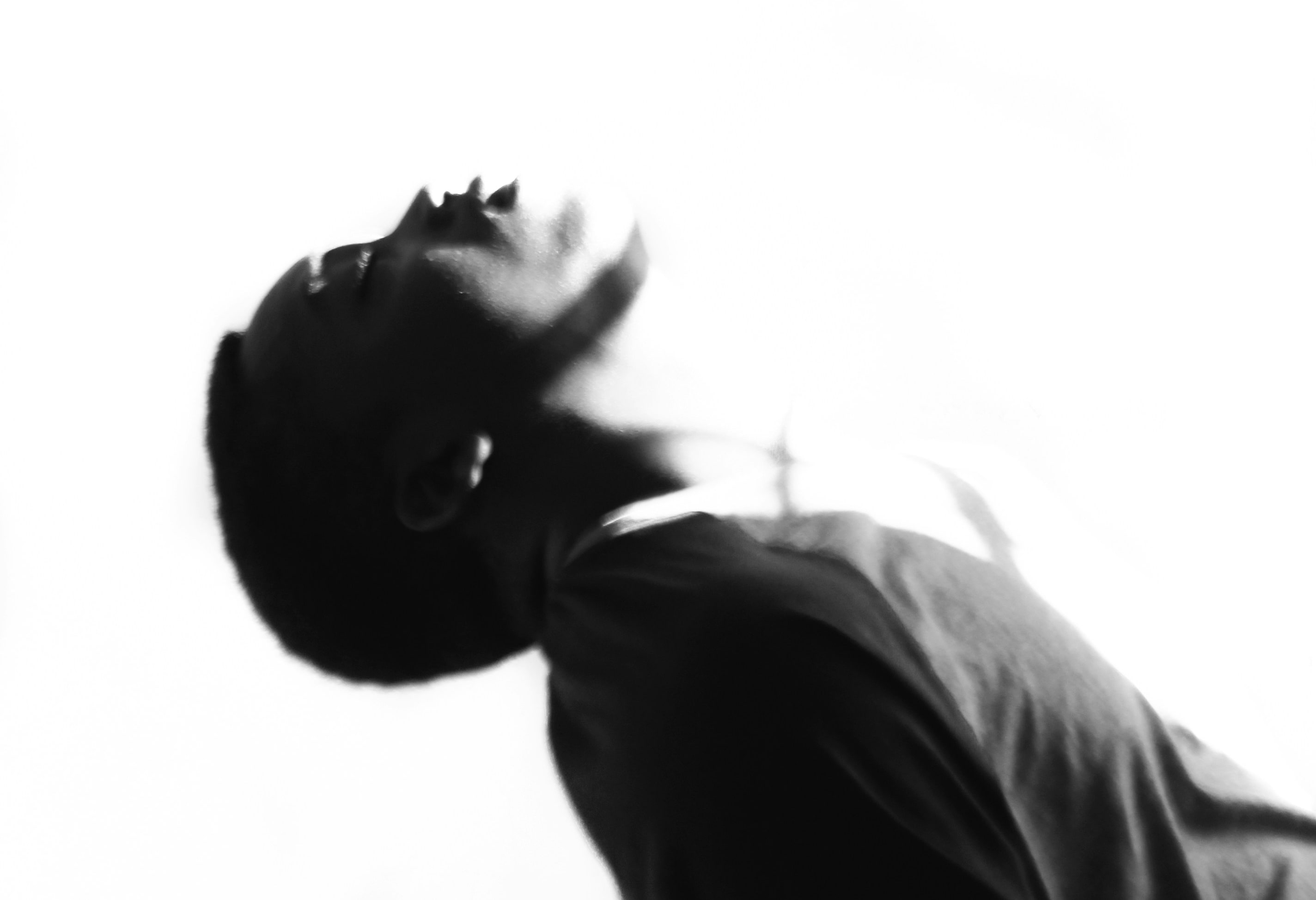 Man pondering looking up